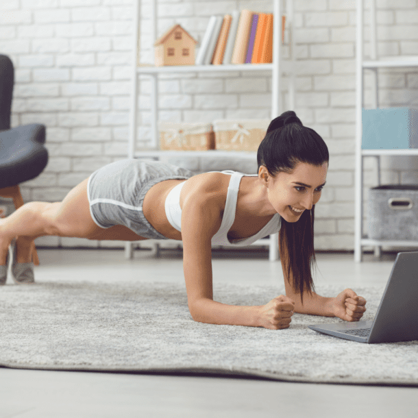 woman exercising at home