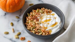 Close up of a bowl filled with our cottage cheese and pumpkin breakfast bowl recipe.