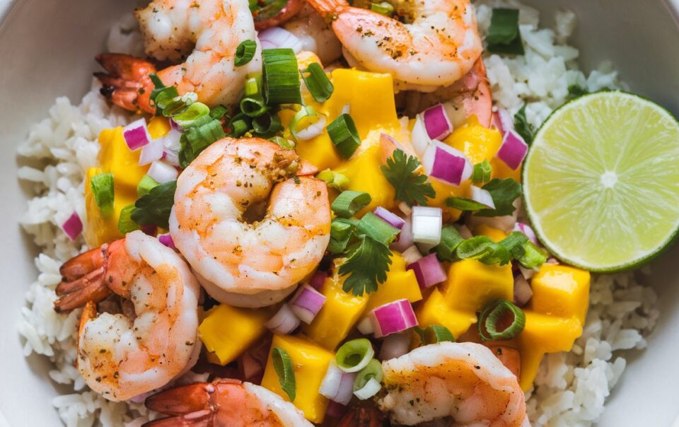 A bowl of Zesty Shrimp and Mango Salsa Rice Bowls