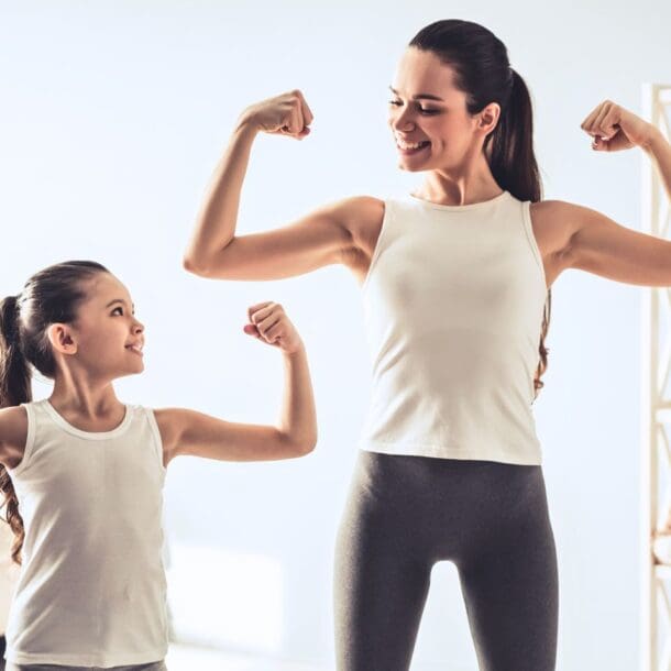 At home workout video with mom and daughter